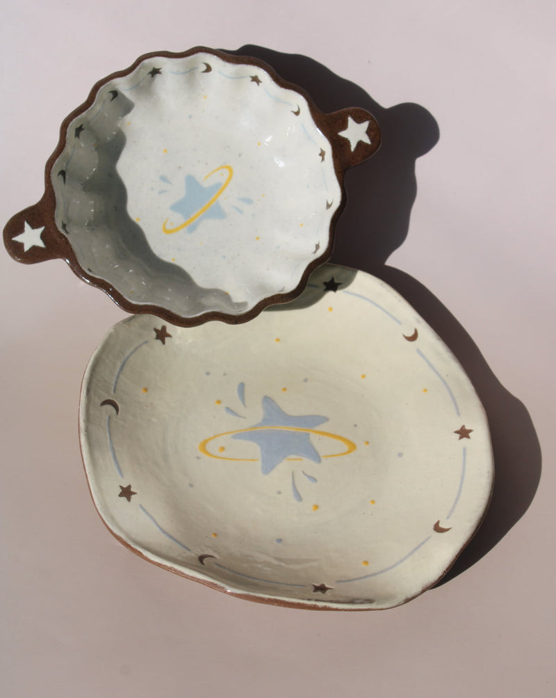 Elio ceramic small plate paired with Nebula sauce dish, handmade celestial tableware with star and moon details.
