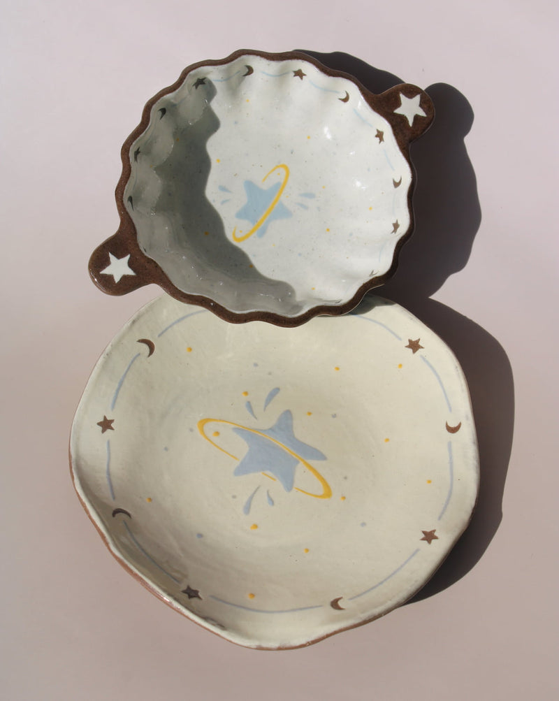Elio ceramic small plate paired with Nebula sauce dish, handmade celestial tableware with star and moon details.