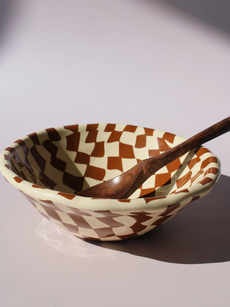 Nova Ceramic Bowl with brown and cream checkered pattern, styled with a green checkered spoon, handmade ceramic bowl top view