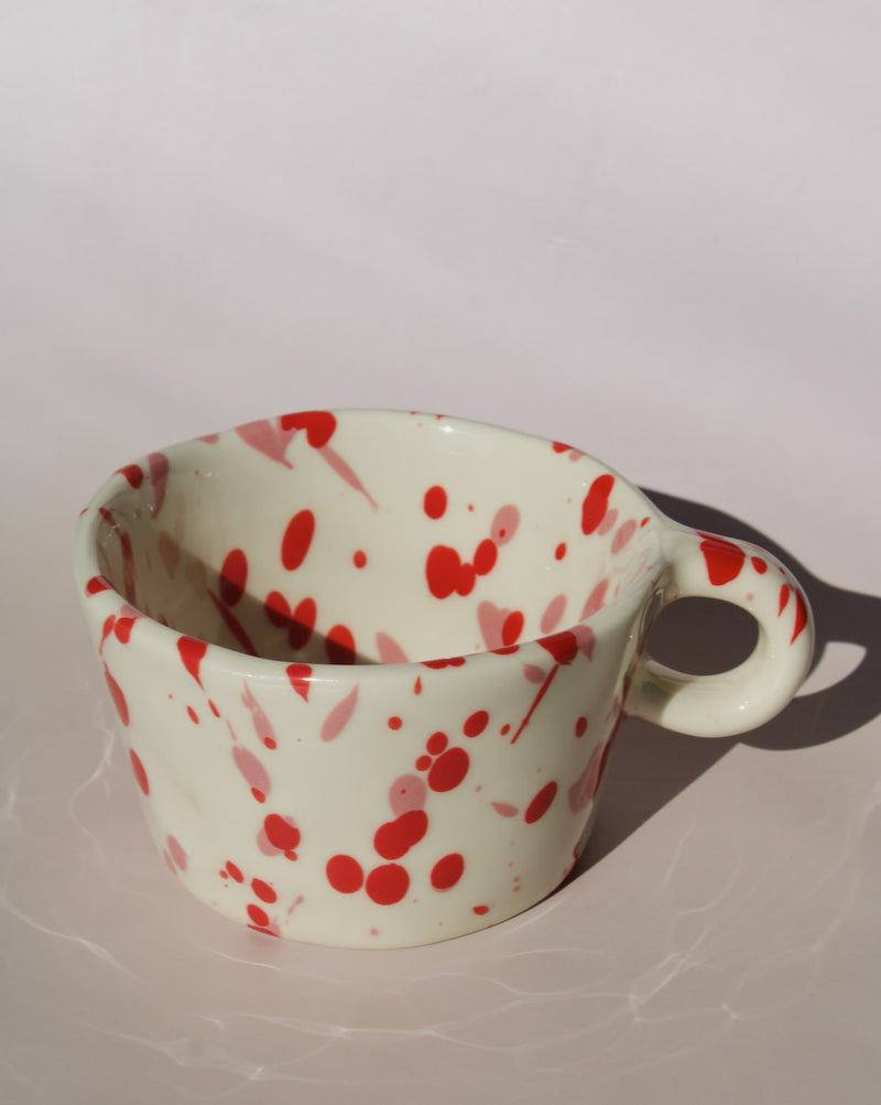 Red splatter ceramic espresso cup with rounded handle, handmade speckled coffee cup.