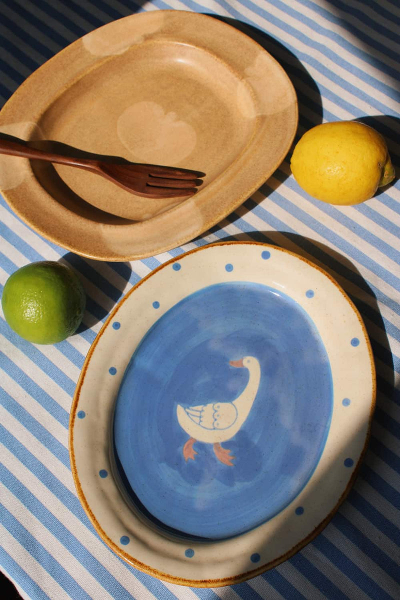 Blue ceramic Pond plate with duck motif and Pom plate with fruit design, handmade plates for snacks and table styling