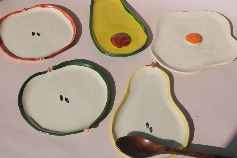 handmade ceramic fruit plates and egg spoon rest set playful kitchen ceramics avocado pear apple plates by Elisa Ceramics