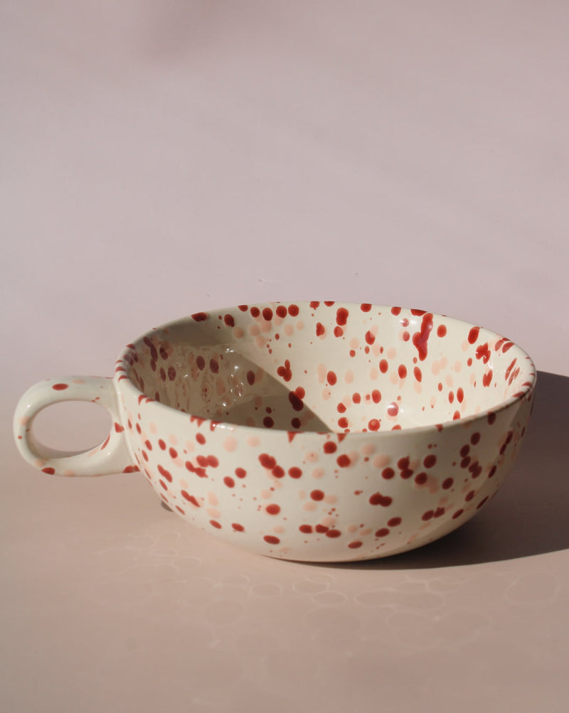 Bera ceramic bowl with pink and red speckled glaze, handmade soup bowl with handle for cozy table settings.