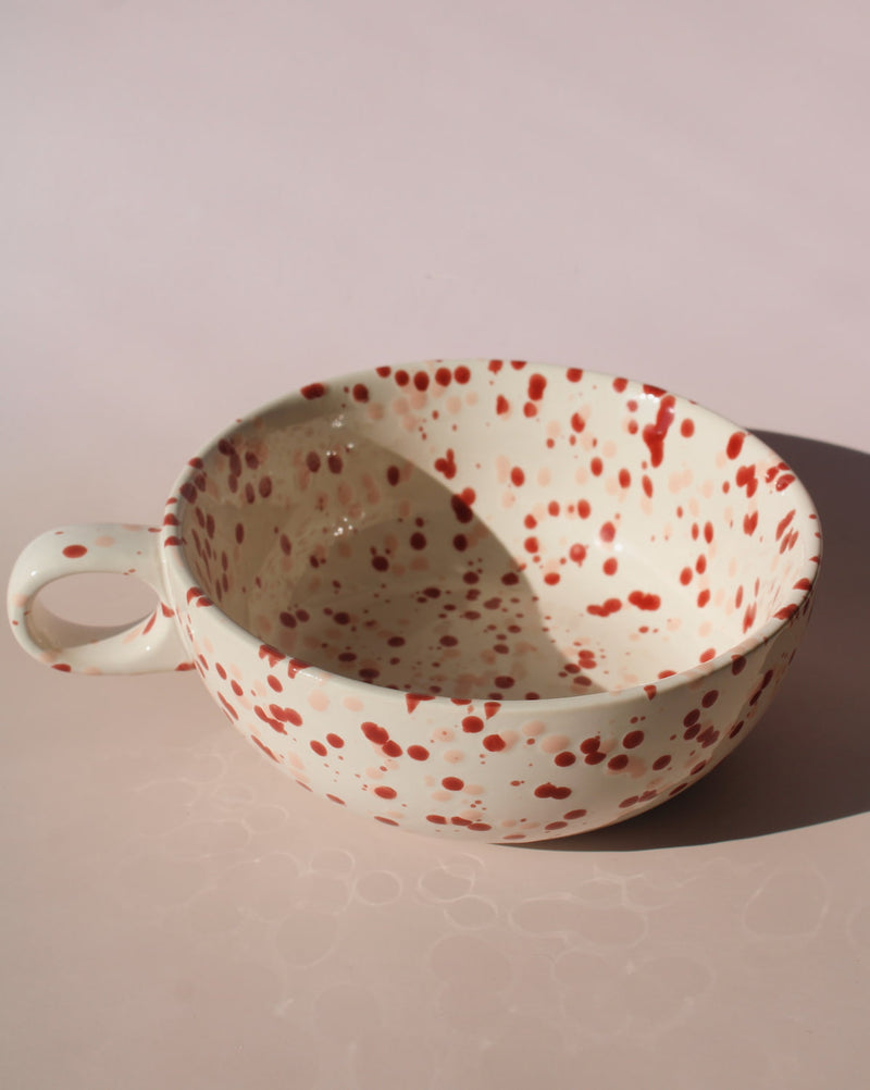 Bera ceramic bowl with pink and red speckled glaze, handmade soup bowl with handle for cozy table settings.