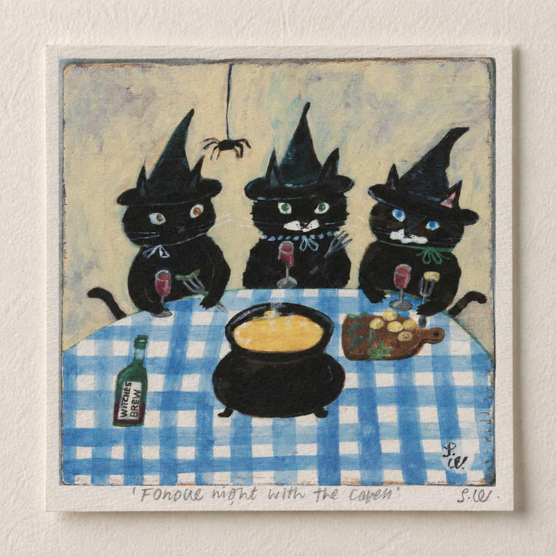 Fondue Night with the Coven Art Print featuring three black cats dressed as witches gathered around a bubbling fondue pot at a blue-and-white checkered table.