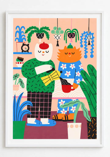 Cats Having Morning Coffee Art Print-A framed art print featuring a whimsical illustration of two cats in a cozy room filled with plants. The left cat is white with a red hat and green sweater, holding a yellow cup.