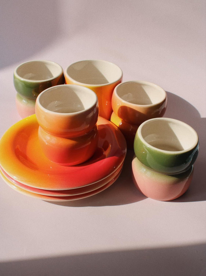 Handmade ceramics by Agata Puławska – colourful ceramic mugs, cups and plates in warm gradients and playful colours