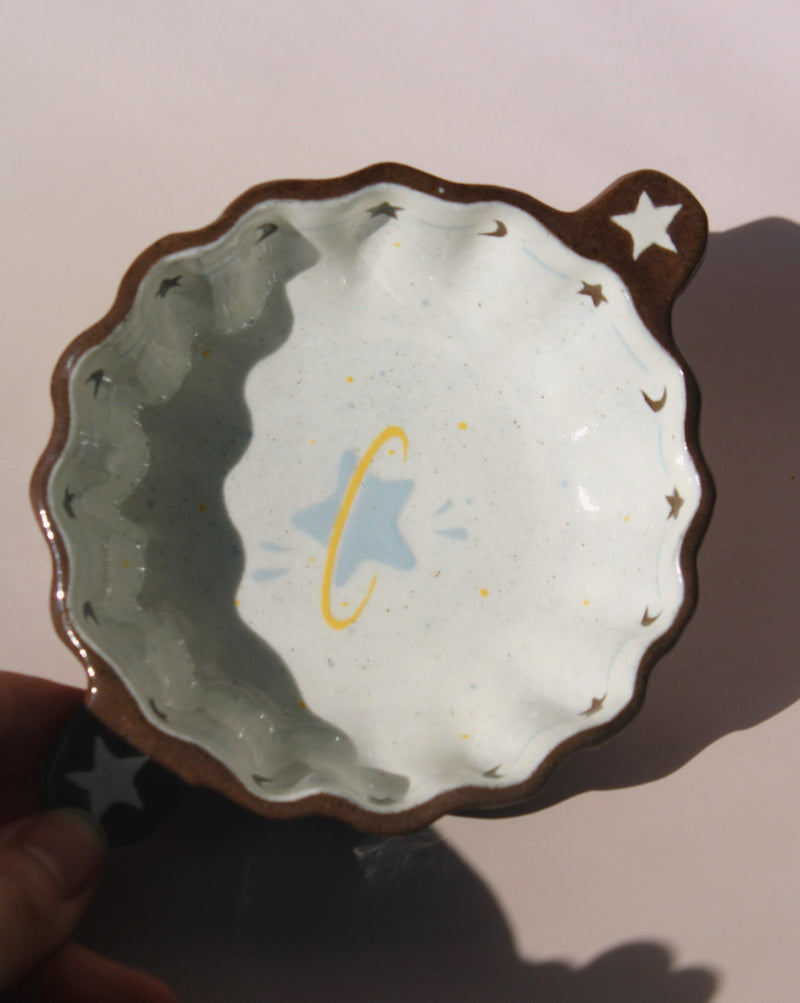 Nebula handmade ceramic sauce dish with scalloped rim and celestial star motif, small dipping bowl for modern table settings.