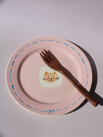 Mimi Ceramic Plate in pink with hand-painted cat face and blue dashed border, handmade ceramic dessert plate