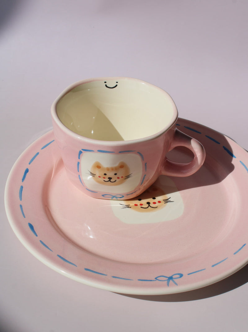 Mimi Ceramic Mug paired with matching Mimi Ceramic Plate, pink cat-themed handmade ceramic set