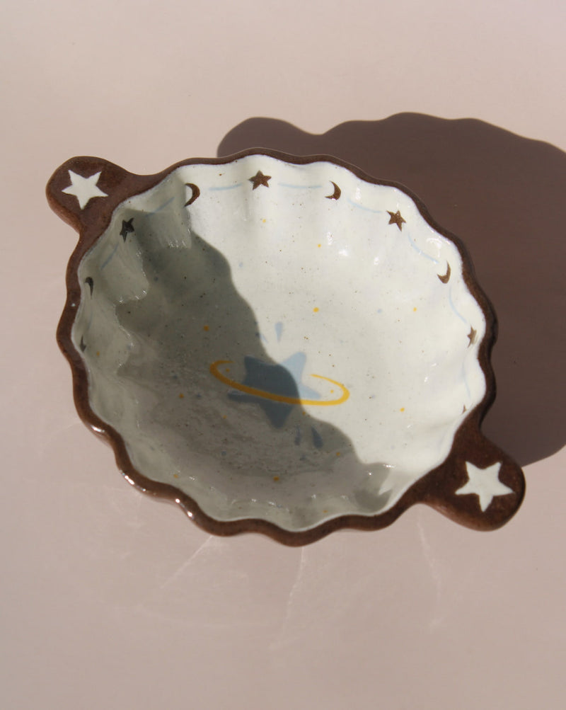 Nebula handmade ceramic sauce dish with scalloped rim and celestial star motif, small dipping bowl for modern table settings.