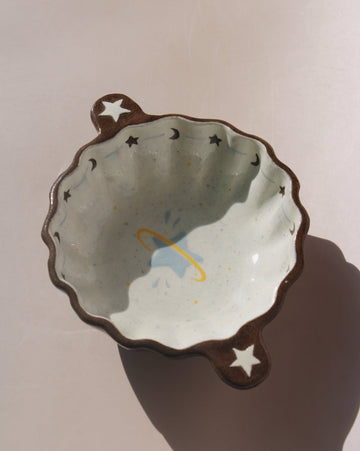 Nebula handmade ceramic sauce dish with scalloped rim and celestial star motif, small dipping bowl for modern table settings.