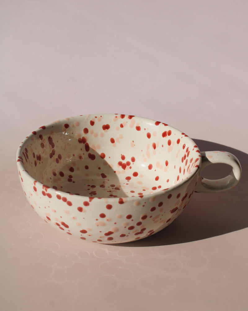 Bera ceramic bowl with pink and red speckled glaze, handmade soup bowl with handle for cozy table settings.