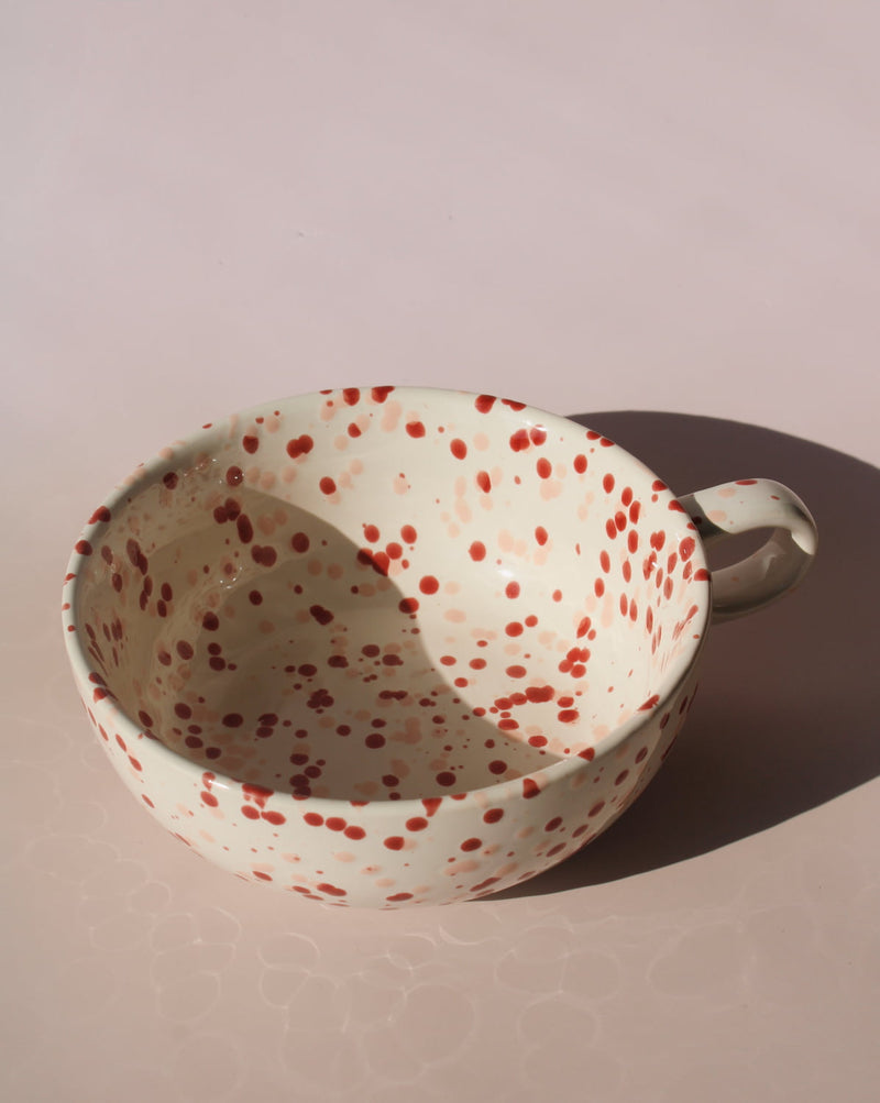 Bera ceramic bowl with pink and red speckled glaze, handmade soup bowl with handle for cozy table settings.