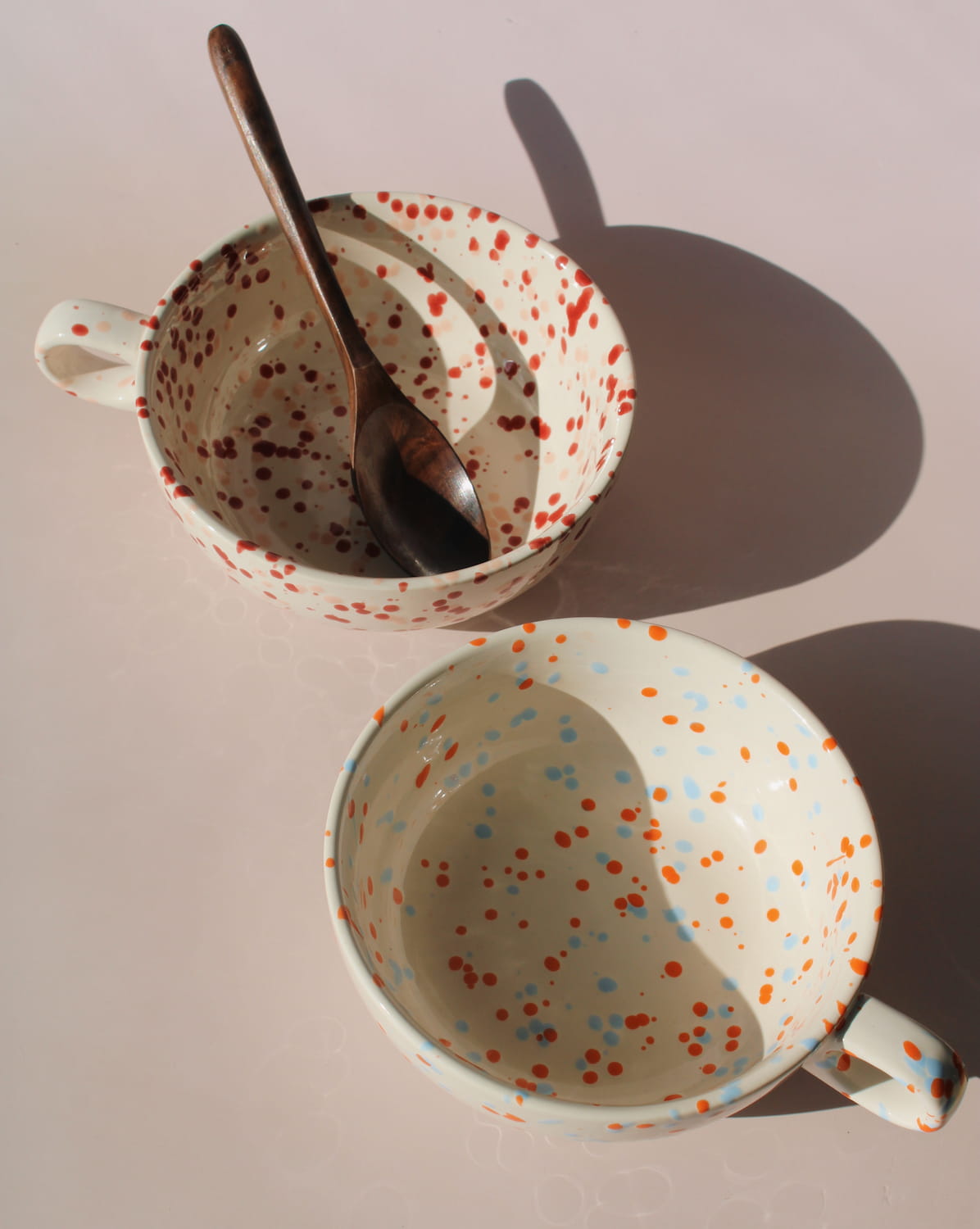 Bera and Naro ceramic bowls with colorful speckled glaze, handmade soup bowls for modern tableware.
