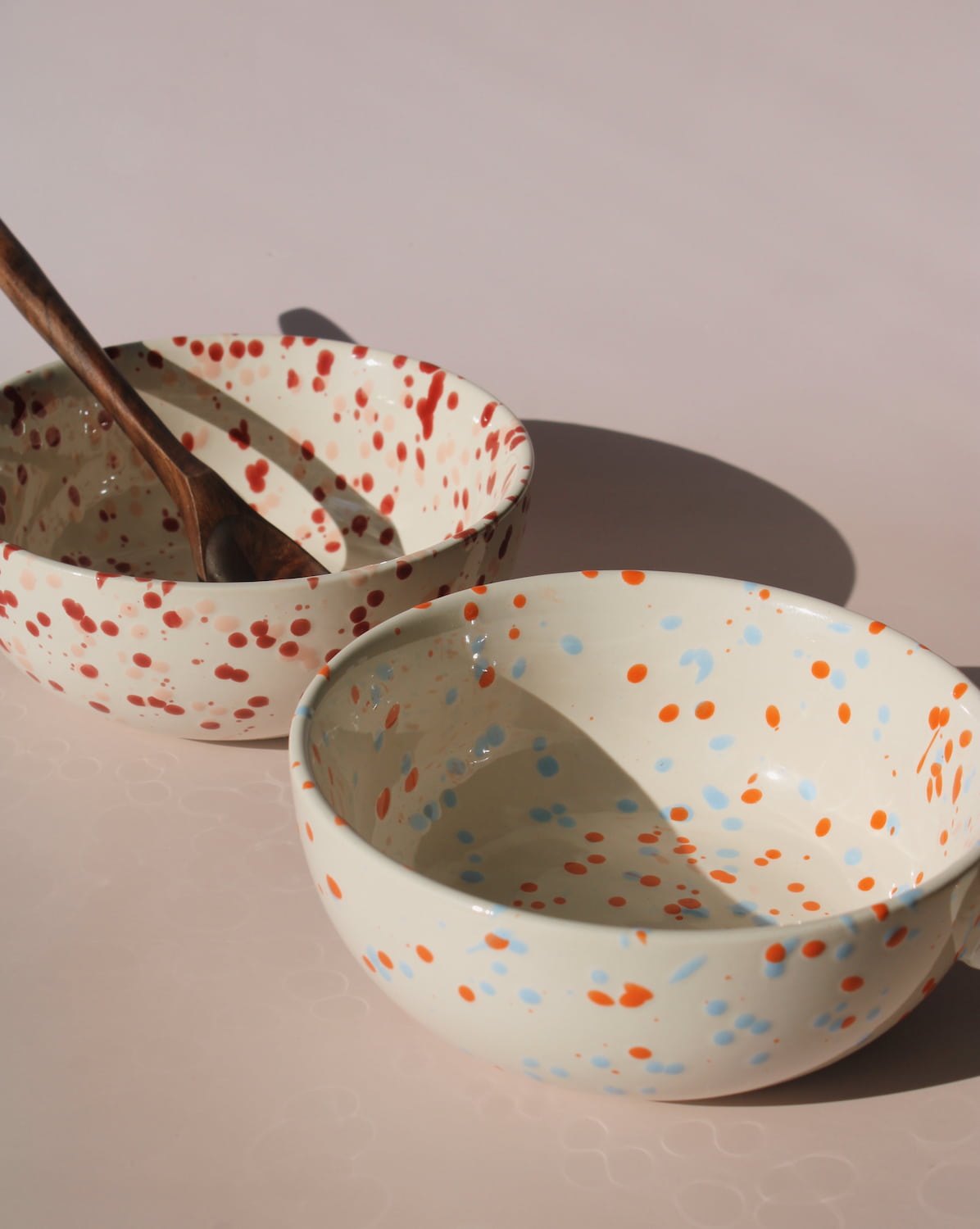 Bera and Naro ceramic bowls with colorful speckled glaze, handmade soup bowls for modern tableware.