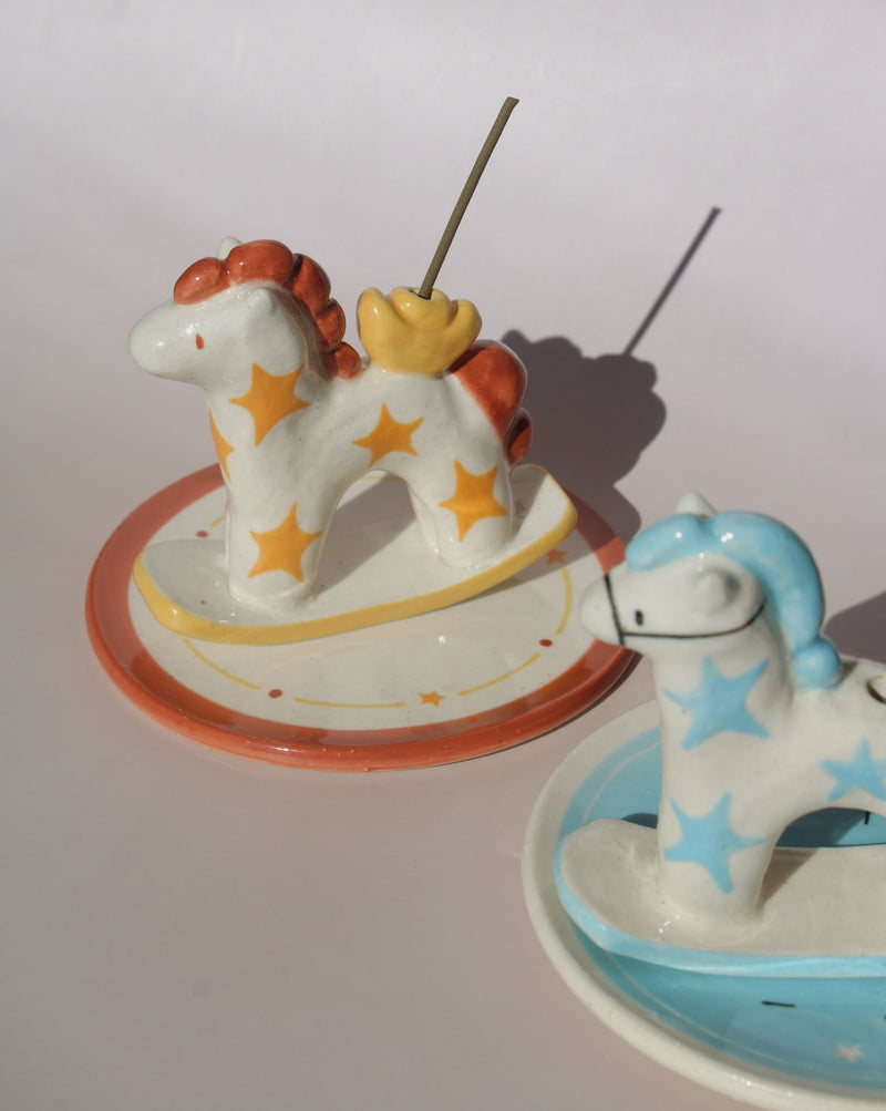 Ponyo ceramic horse incense holder with yellow stars and warm terracotta accents, whimsical ceramic incense burner with star tray.