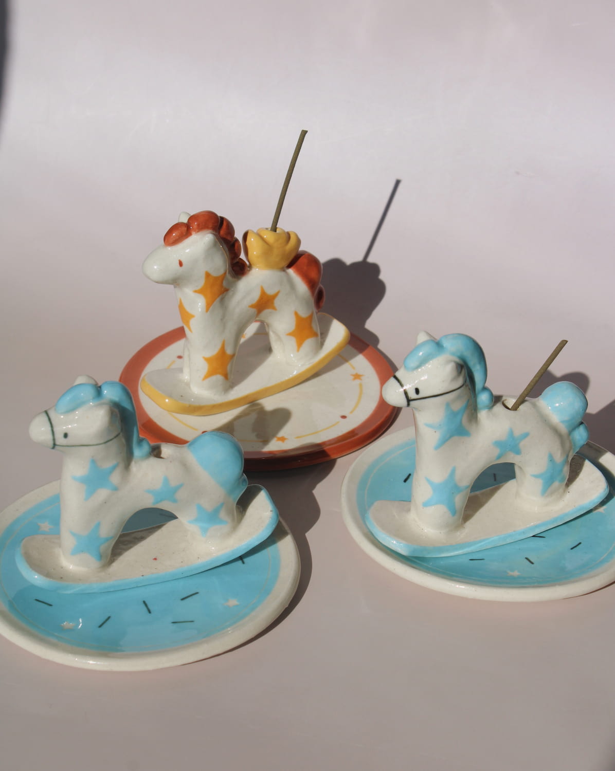 Ponyo and Ponette ceramic horse incense holders with star patterns, colorful whimsical incense burners for home decor.