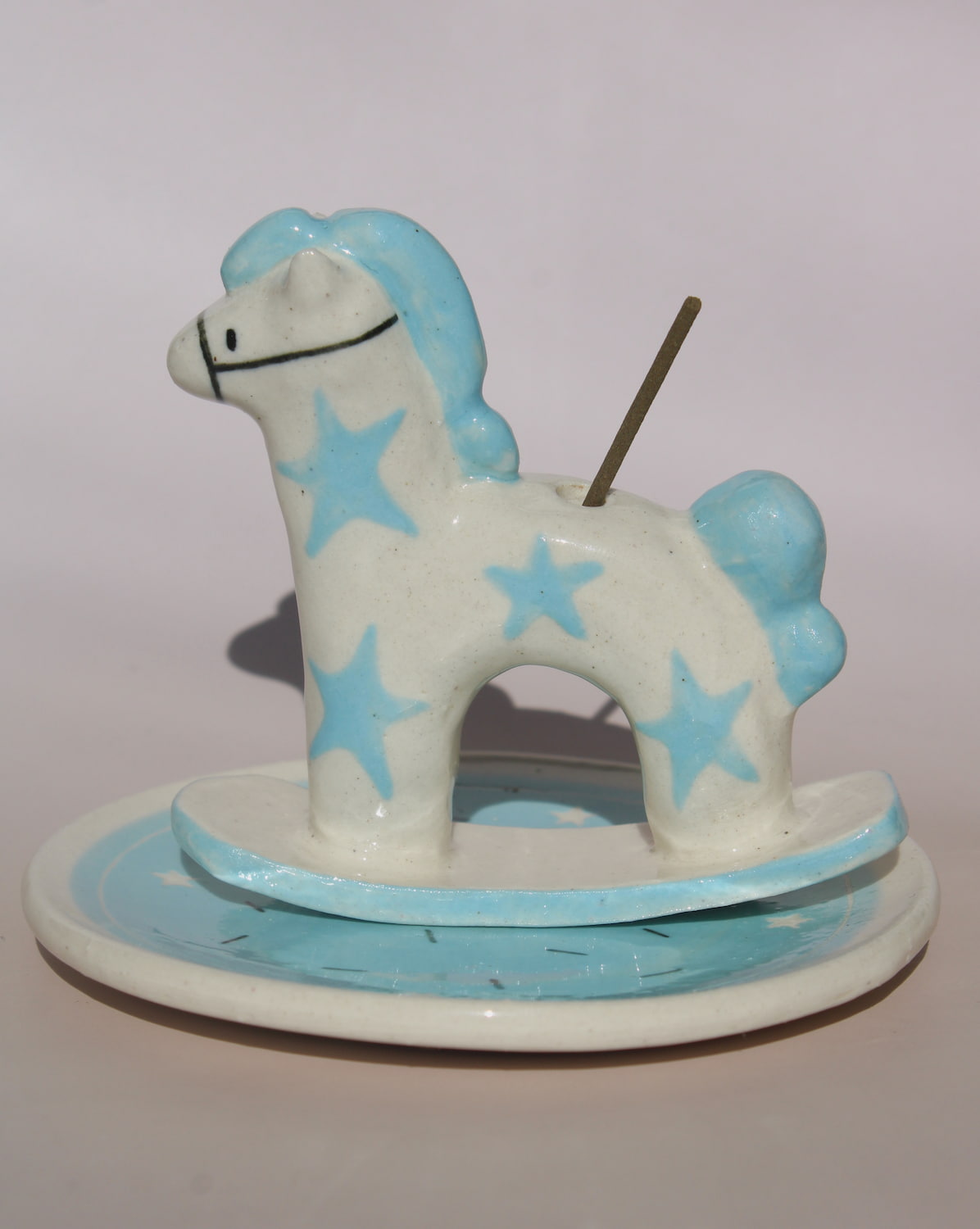 Ponette ceramic horse incense holder with blue stars and matching tray, playful ceramic incense burner for home decor.