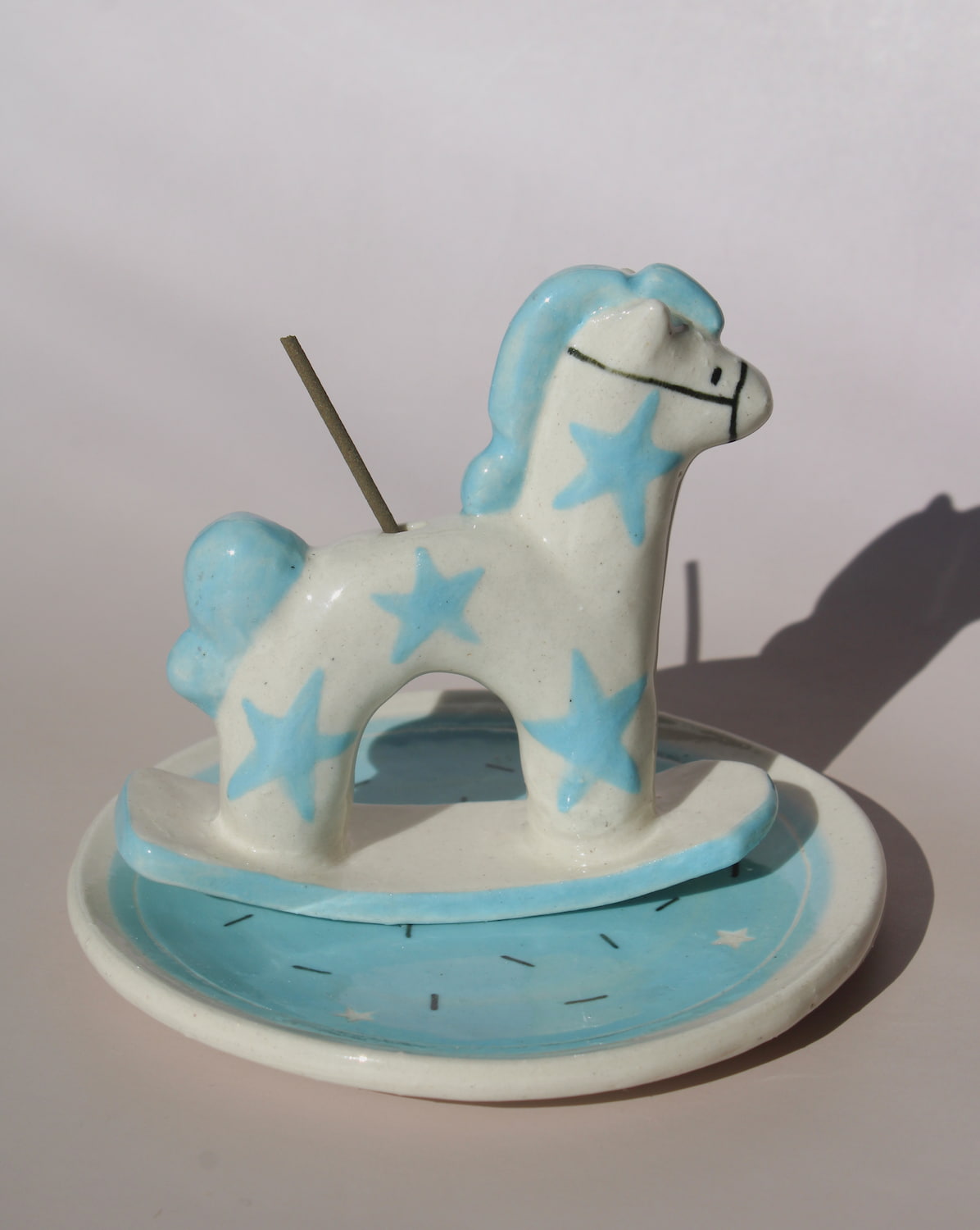Ponette ceramic horse incense holder with blue stars and matching tray, playful ceramic incense burner for home decor.