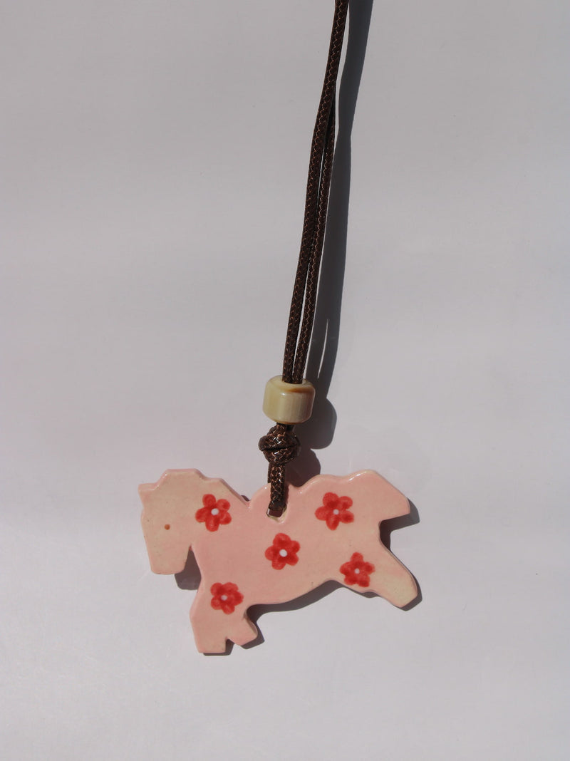 Pony Charm Necklace in Petal Pony design, pink ceramic horse pendant with red flower pattern on brown cord