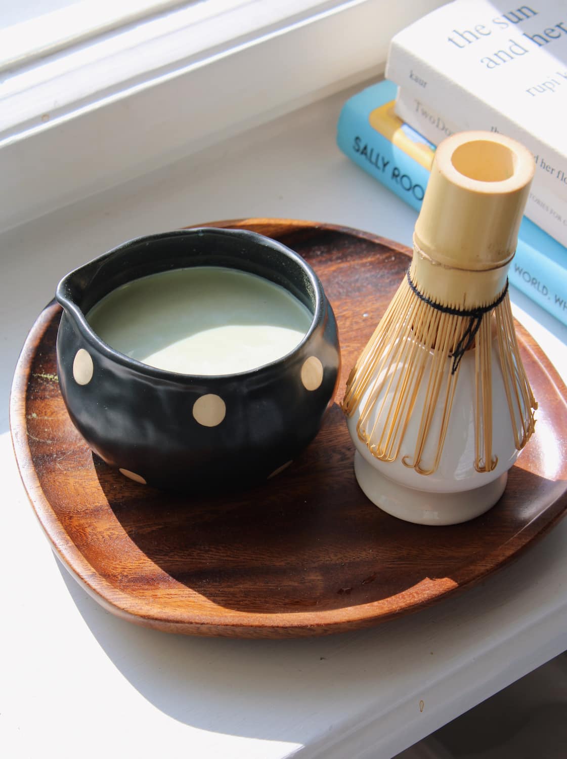 Ceramic mochi matcha bowl paired with chasen whisk and tea ritual setting