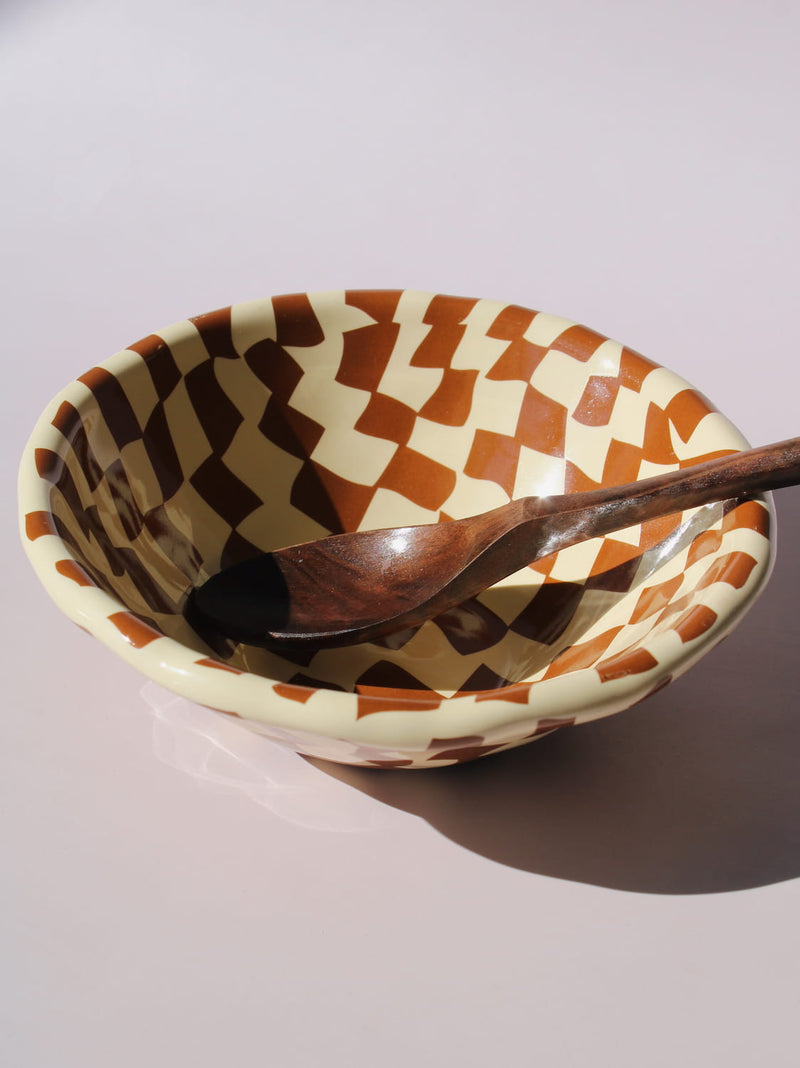 Nova Ceramic Bowl with brown and cream checkered pattern, styled with a green checkered spoon, handmade ceramic bowl top view