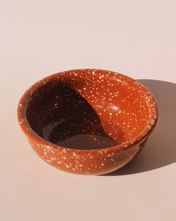 Terracotta speckled ceramic bowl with earthy glaze, handmade stoneware bowl for soups, snacks, and modern table settings.