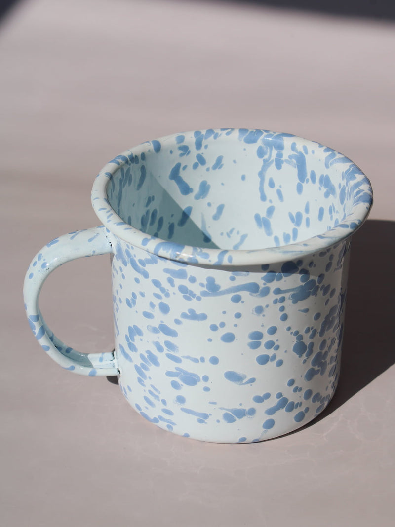 Aeris Enamel Mug in speckled baby blue, handmade enamel coffee mug top angle view