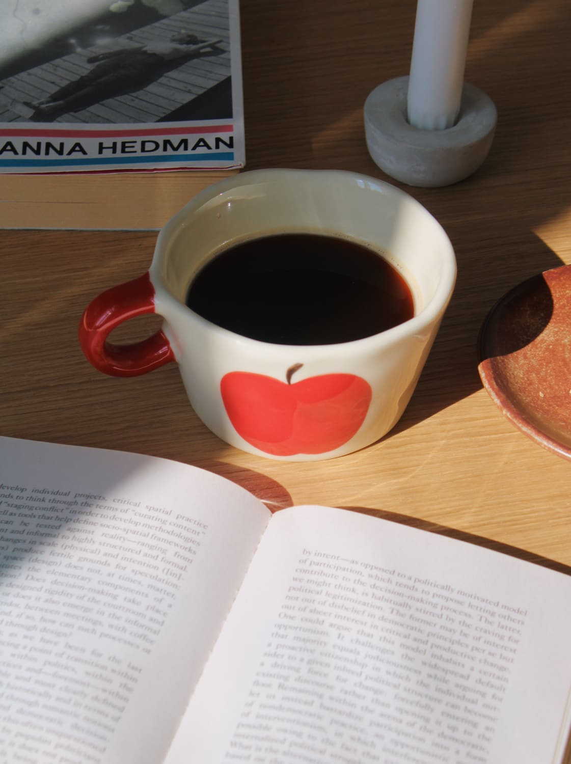 Pom ceramic mug with red apple design, handmade coffee cup for cozy mornings and everyday use