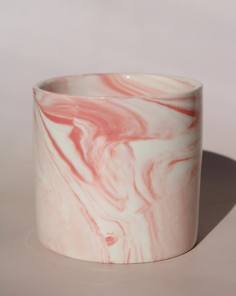 Blush ceramic cup with soft pink marble swirl glaze, handmade stoneware cup for coffee, tea, or everyday drinks.