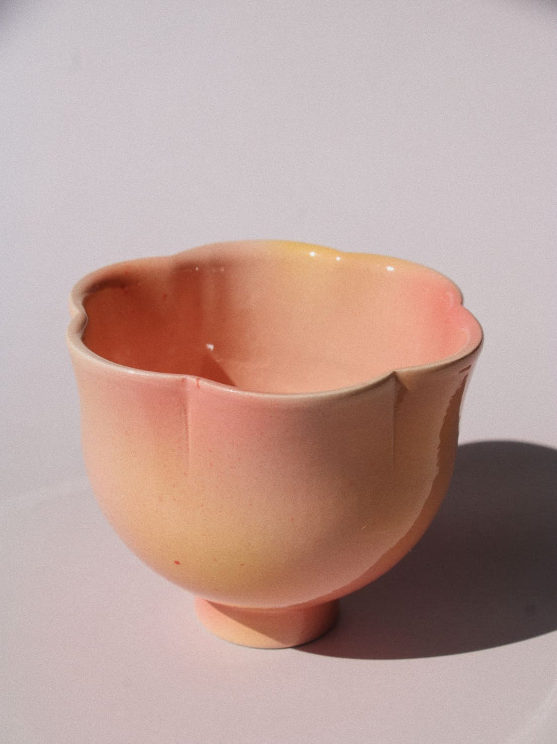 Garden Flower Yunomi Cup against a pink background