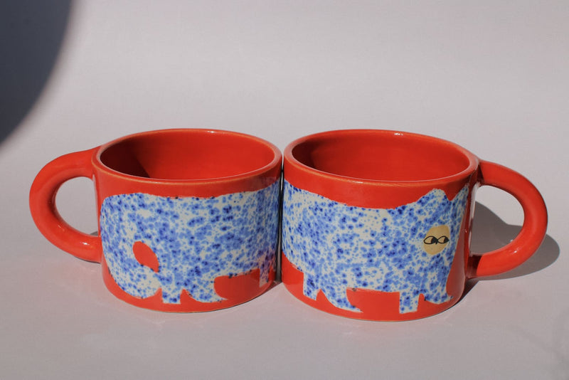 Scarlet Ceramic Cat Mug by Marta Shurpakova – handmade red ceramic mug with a playful cat design