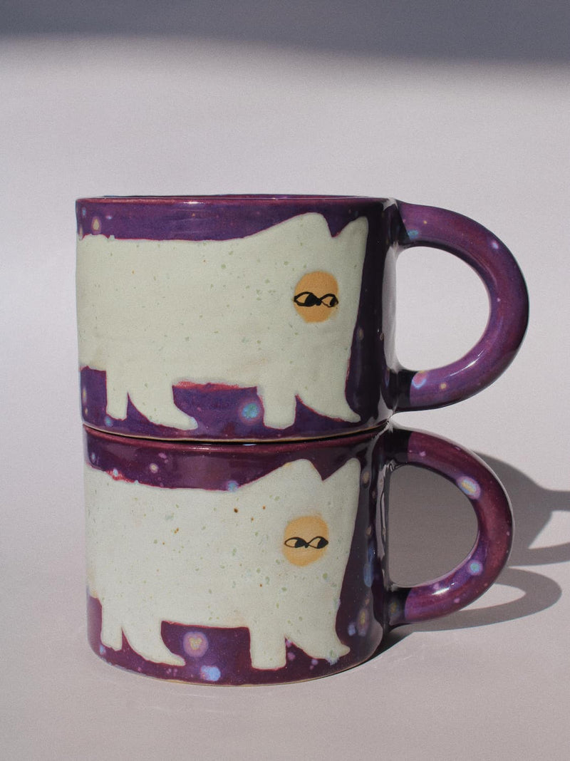Mulberry Ceramic Cat Mug by Marta Shurpakova – handmade purple and cream ceramic mug with a playful cat design