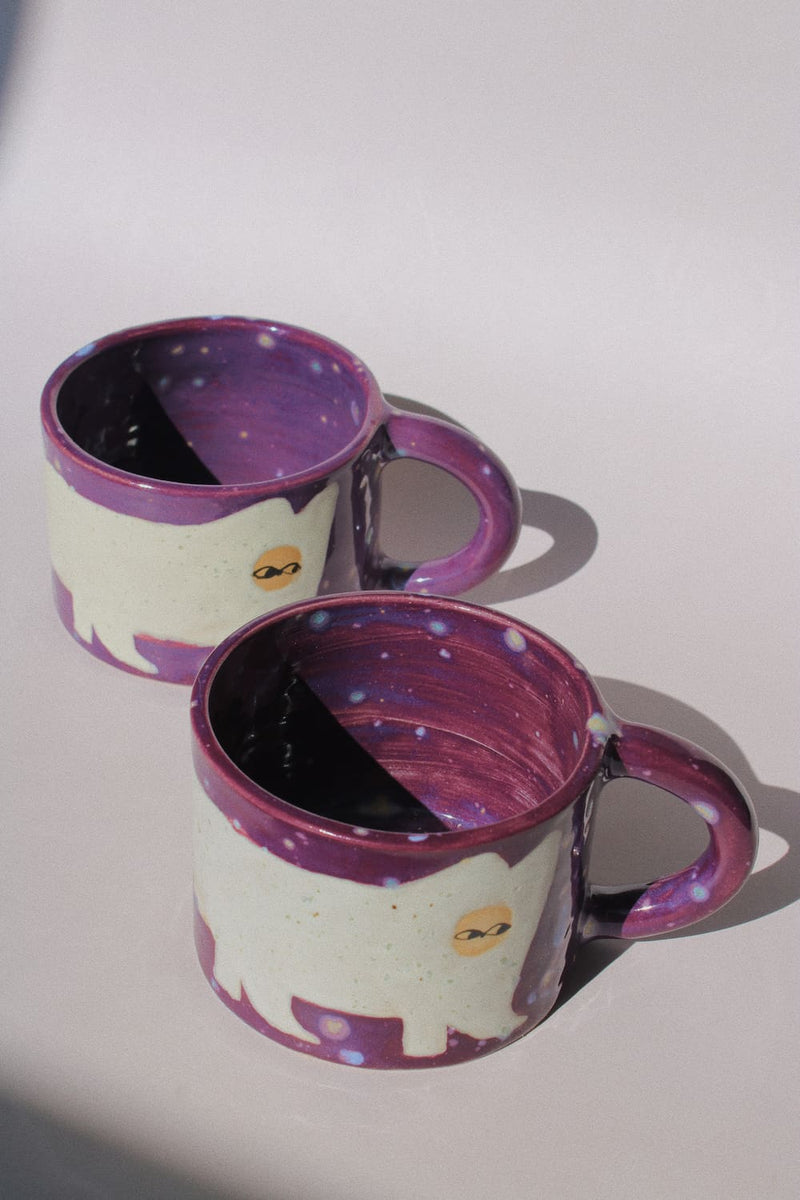Mulberry Ceramic Cat Mug by Marta Shurpakova – handmade purple and cream ceramic mug with a playful cat design