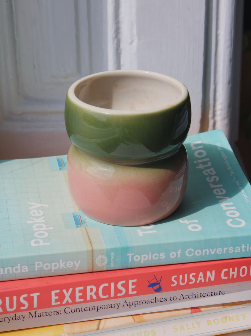 Belly Garden Ceramic Mug by Agata Puławska – colourful handmade ceramic mug styled with coffee 