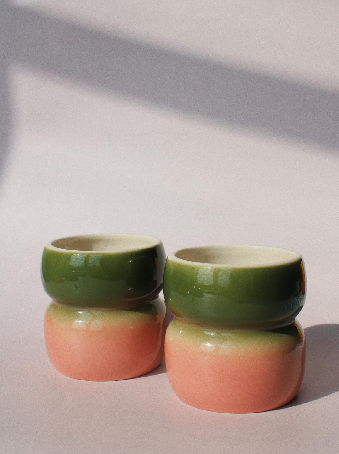 Belly Garden Ceramic Mug by Agata Puławska – handmade ceramic mug with a deep green and soft blush pink glaze