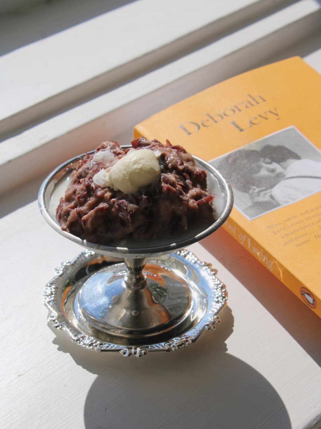 Lacey Silver dessert plate and pedestal stand with ornate filigree rim detail, styled with chocolate dessert and vanilla ice cream
