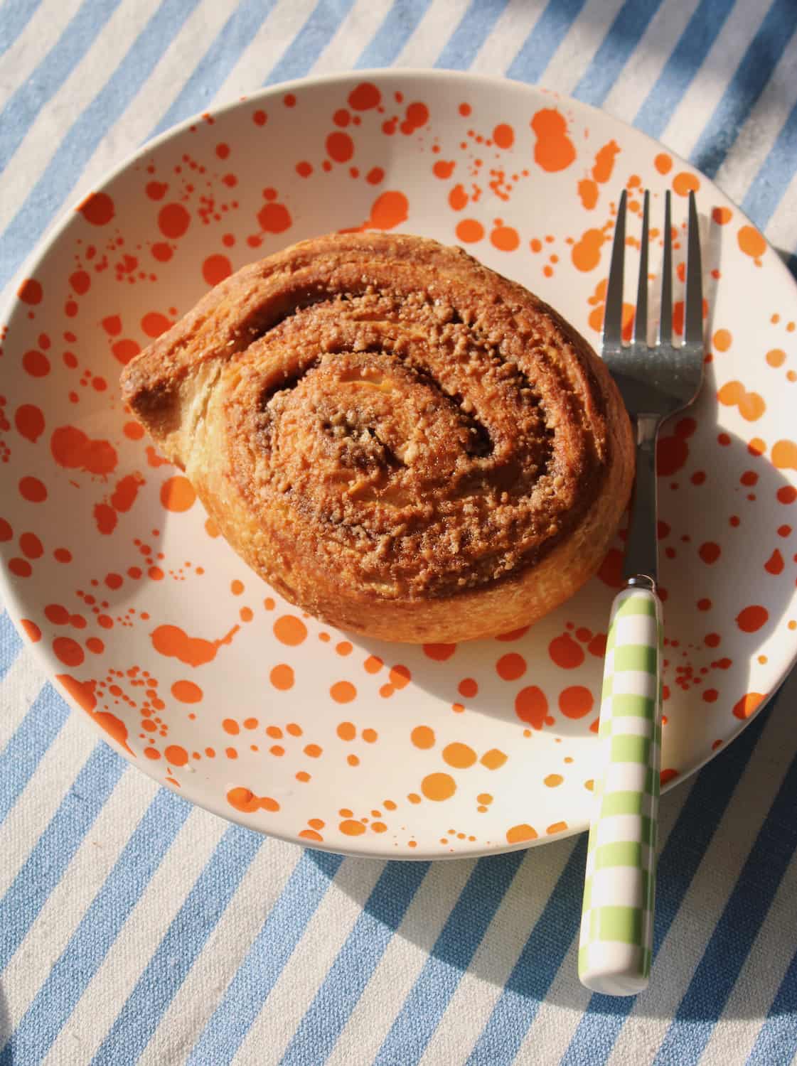 Corra ceramic plate with pastry handmade orange splatter dessert plate aesthetic breakfast setting