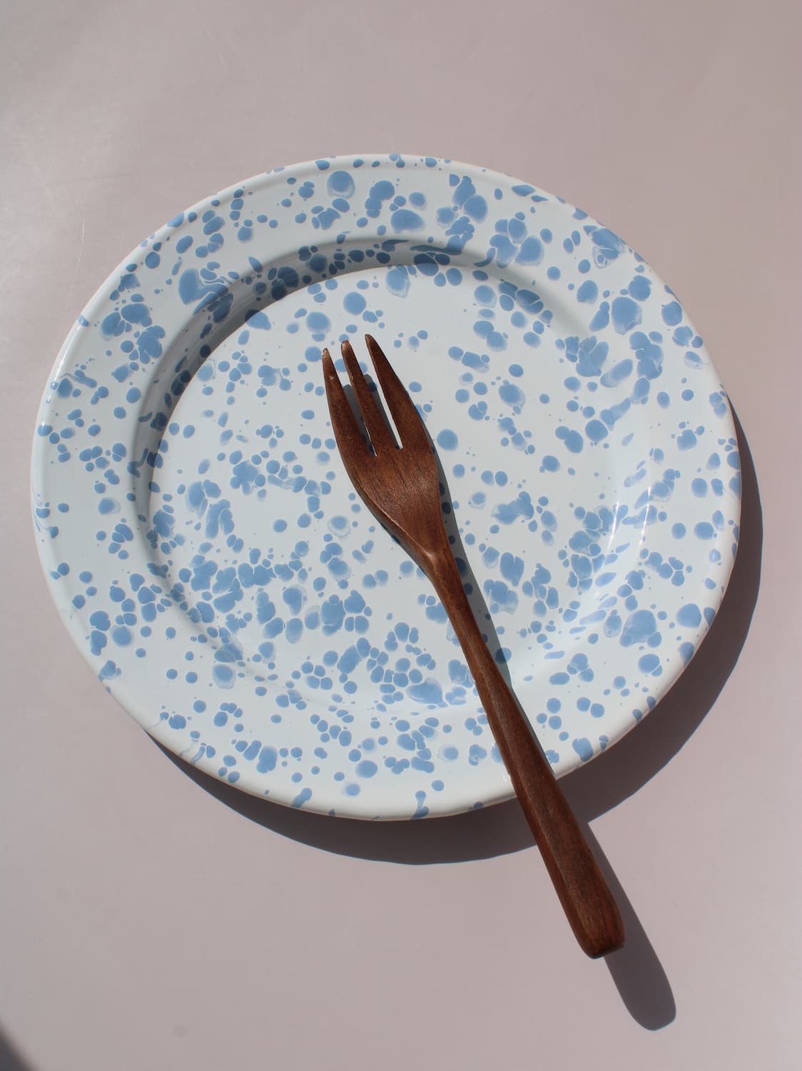 Aeris Enamel Plate in speckled baby blue, handmade enamel dessert plate top view