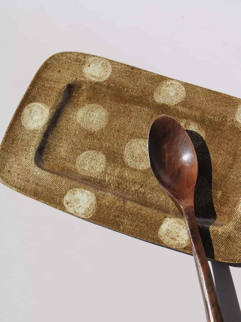 Biscotti Ceramic Plate in brown with ivory polka dots, rectangular handmade ceramic serving plate top view