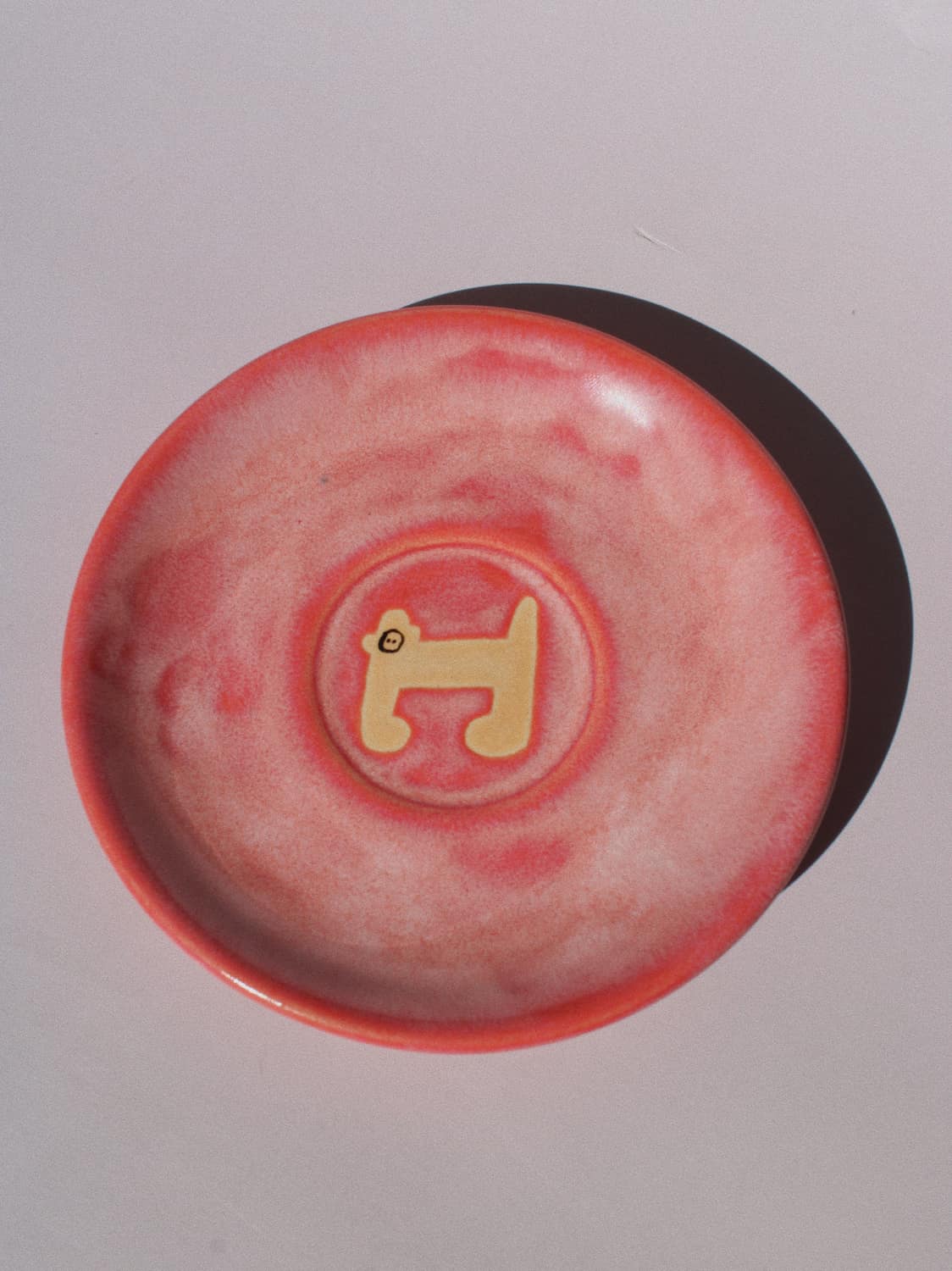 Candy Monkey Ceramic Plate by Marta Shurpakova – handmade pink ceramic plate with a playful monkey design