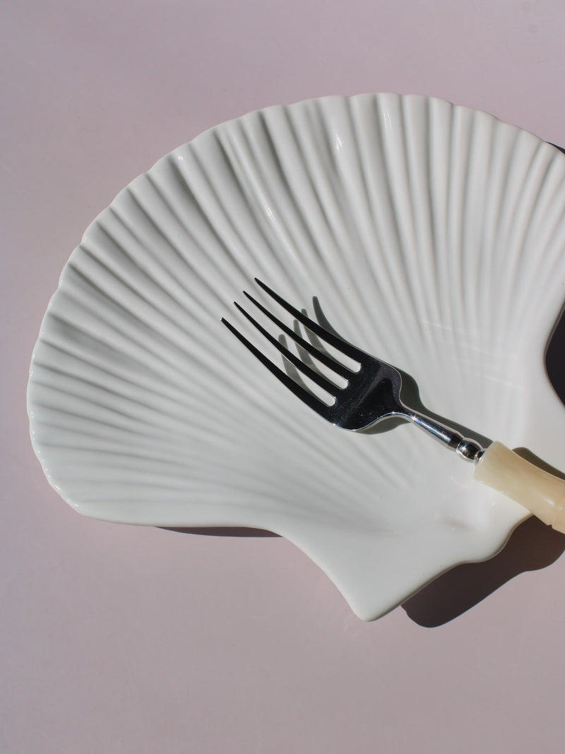 Calista Ceramic Shell Plate in white scallop shell shape with ribbed fan texture, handmade ceramic trinket plate