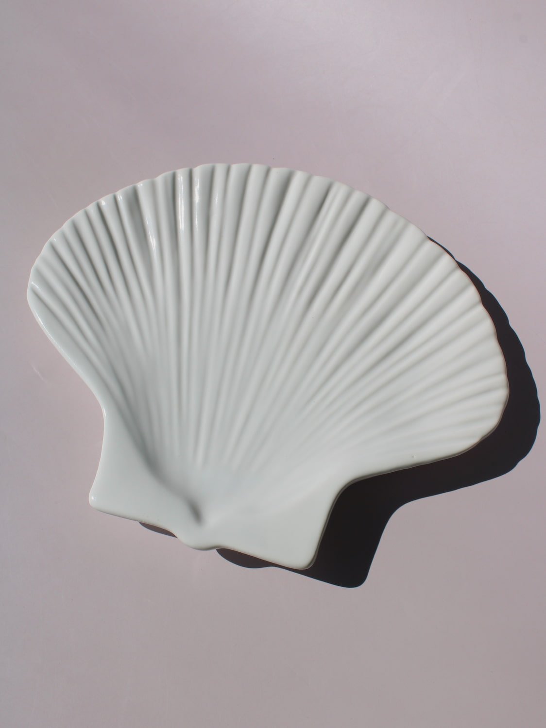 Calista Ceramic Shell Plate in white scallop shell shape with ribbed fan texture, handmade ceramic trinket plate