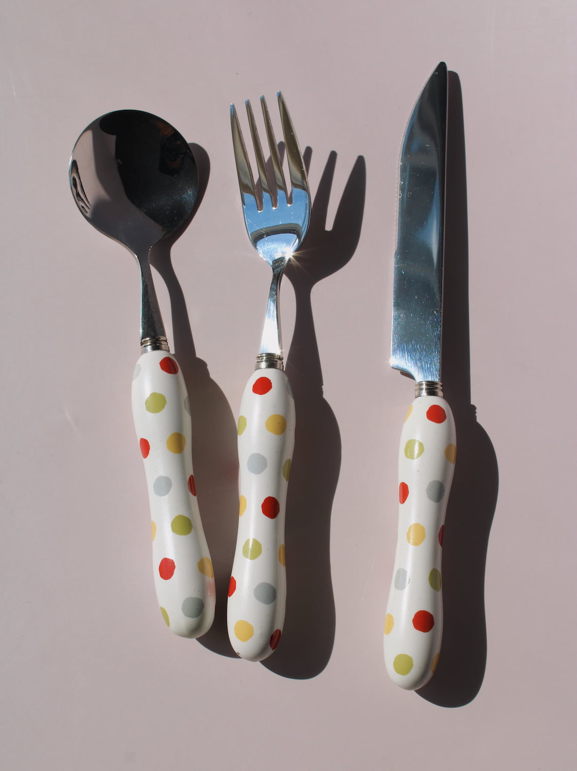Confetti Ceramic Cutlery Set with multicolor polka dot handles, stainless steel knife, spoon and fork, handmade ceramic flatware