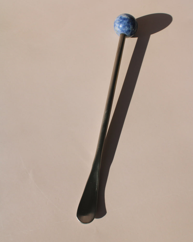Aster Astra Stone Stirrer with deep blue stone sphere, elegant drink stirrer for cocktails, coffee, or matcha rituals.