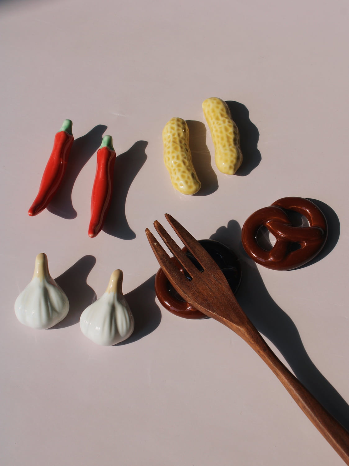 Chili, Peanut and Garlic Ceramic Chopstick Rest Sets together, handmade ceramic novelty chopstick rests in red chili, peanut and garlic clove shapes