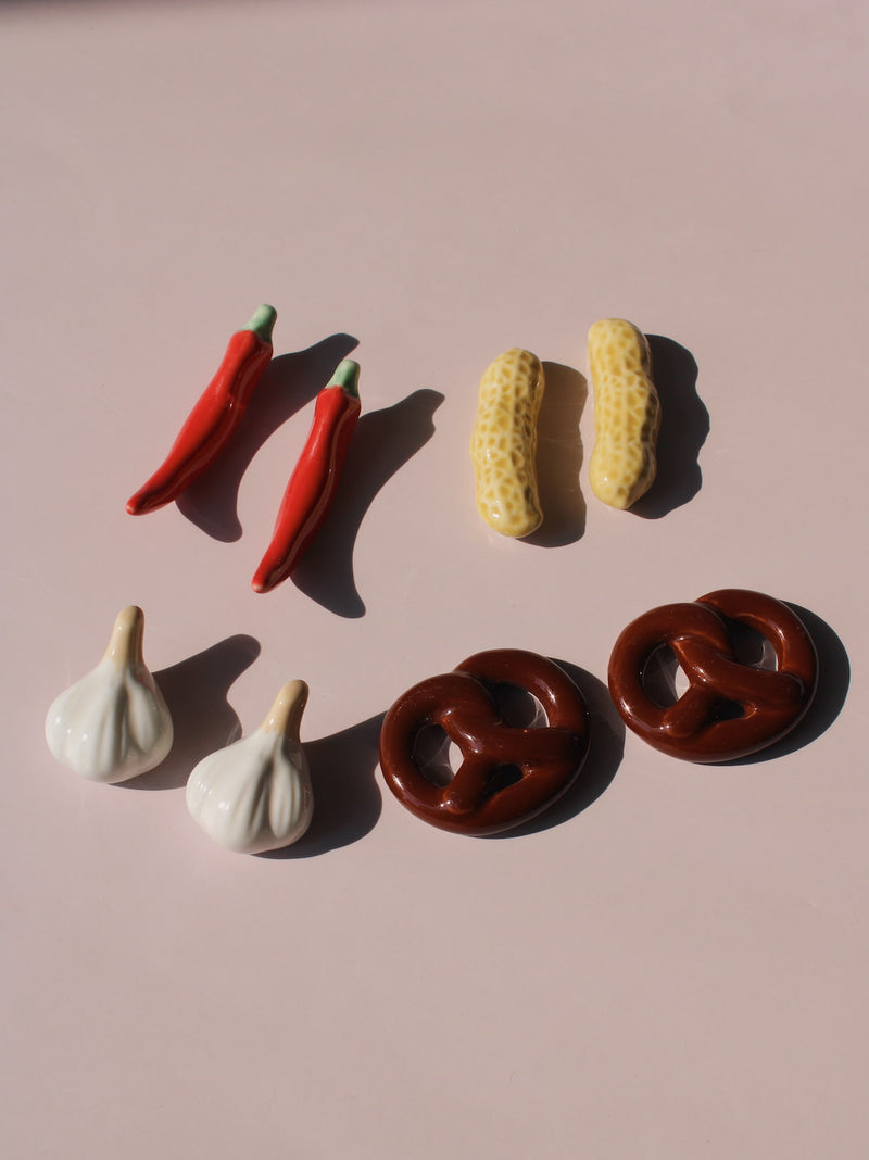 Chili, Peanut and Garlic Ceramic Chopstick Rest Sets together, handmade ceramic novelty chopstick rests in red chili, peanut and garlic clove shapes