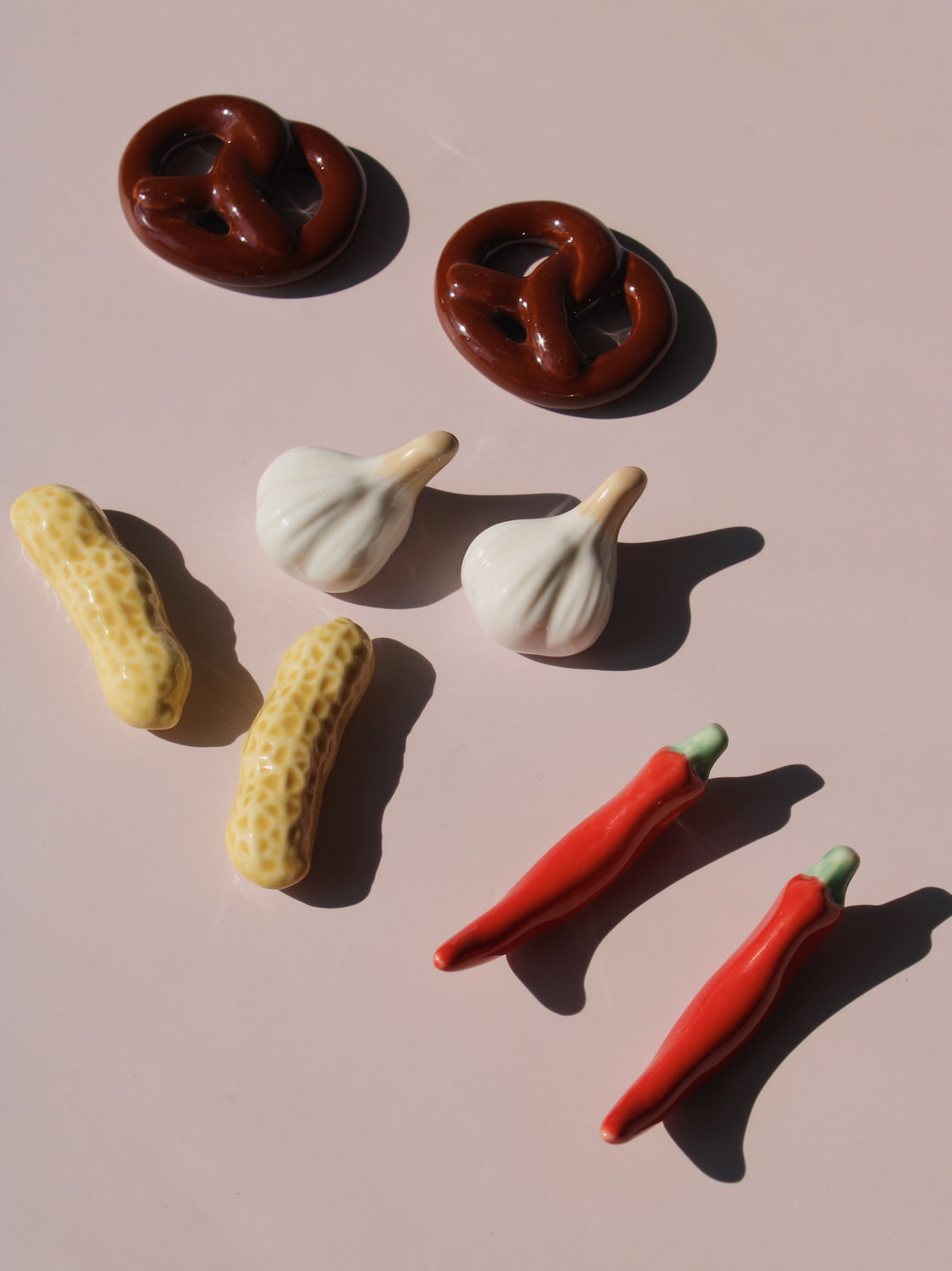Chili, Peanut and Garlic Ceramic Chopstick Rest Sets together, handmade ceramic novelty chopstick rests in red chili, peanut and garlic clove shapes