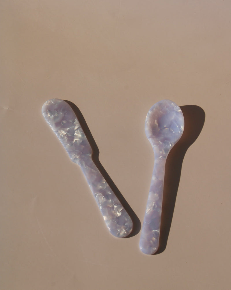 Lavender marbled resin dessert spoons with pearlescent finish, aesthetic acrylic tableware.